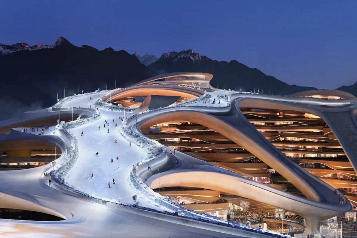 Arábia Saudita constrói Trojena, cidade de inverno esculpida em montanha no deserto, movida a energia renovável e desafiando clima e geologia.