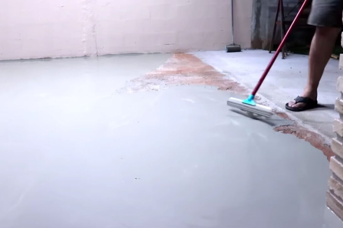irregular concrete floor receives self-leveling cement, resin, and bubble roller in a simple method that levels, gives shine, and significantly reduces renovation costs.