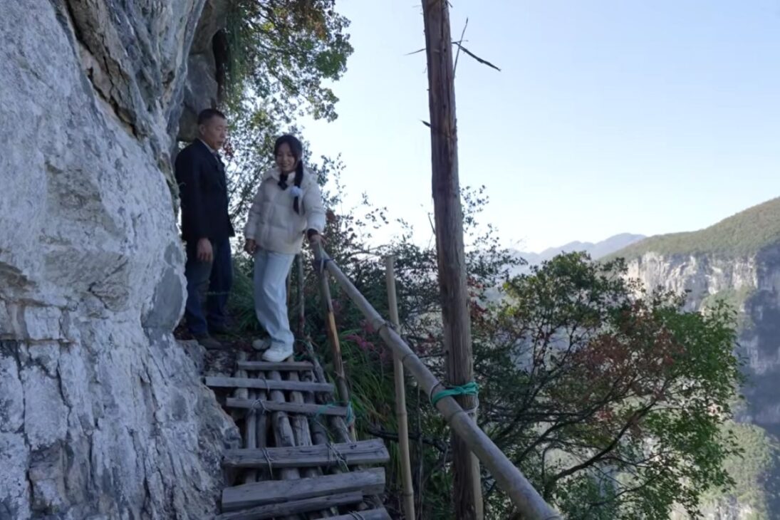 man in China opens a five kilometer scenic trail on a cliff and transforms an isolated landscape with manual labor.