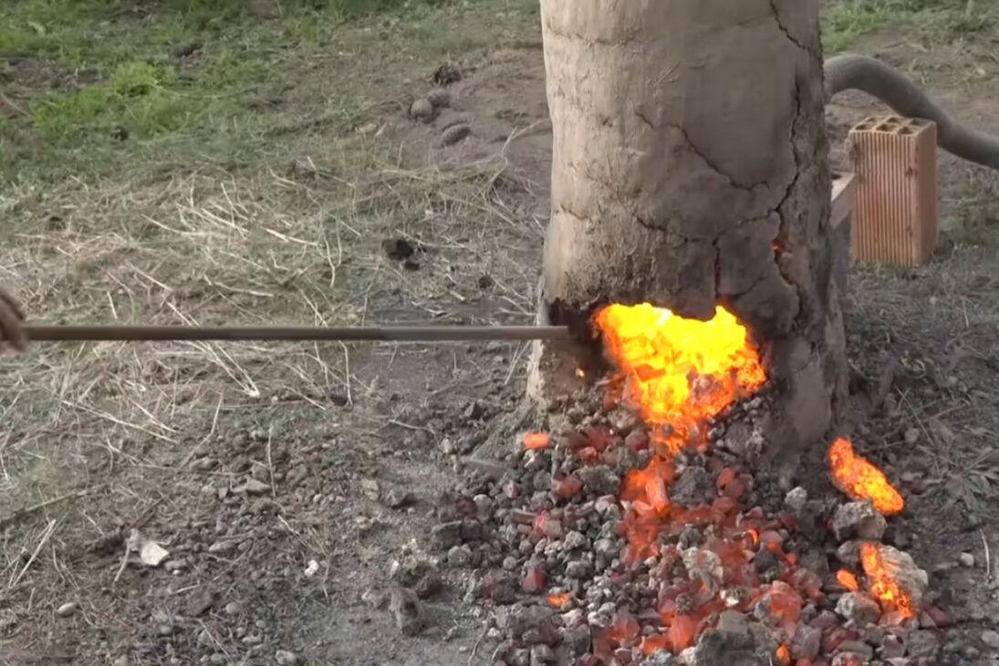 Primitive furnace of the Iron Age uses clay, limonite, vegetable charcoal, and iron in an experiment that recreates an ancient metallurgical technique.