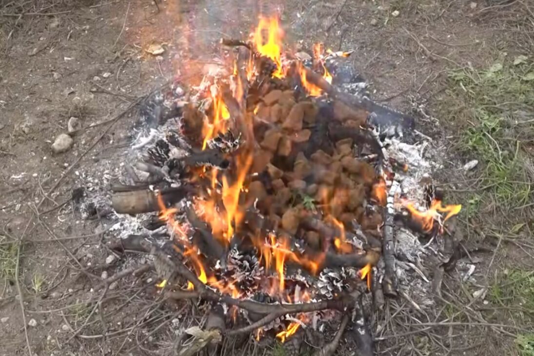 Primitive furnace of the Iron Age uses clay, limonite, vegetable charcoal, and iron in an experiment that recreates an ancient metallurgical technique.