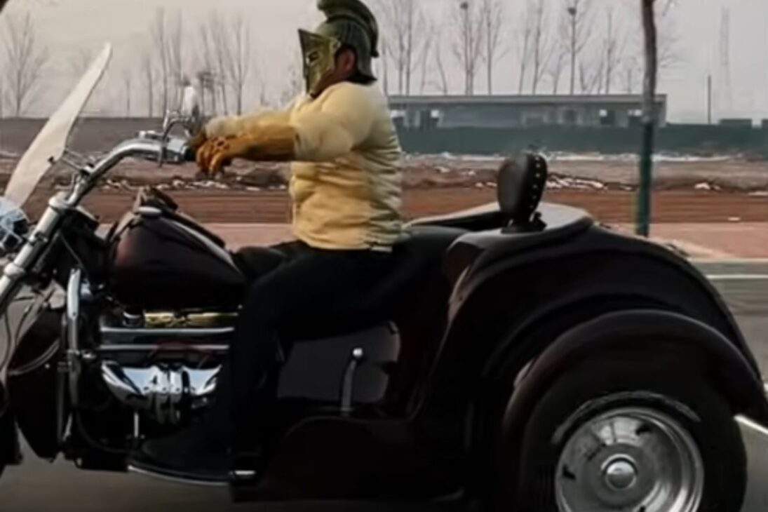 Motorcycle with V8 engine undergoing restoration; carburetor and painting redone to become a unique display piece.