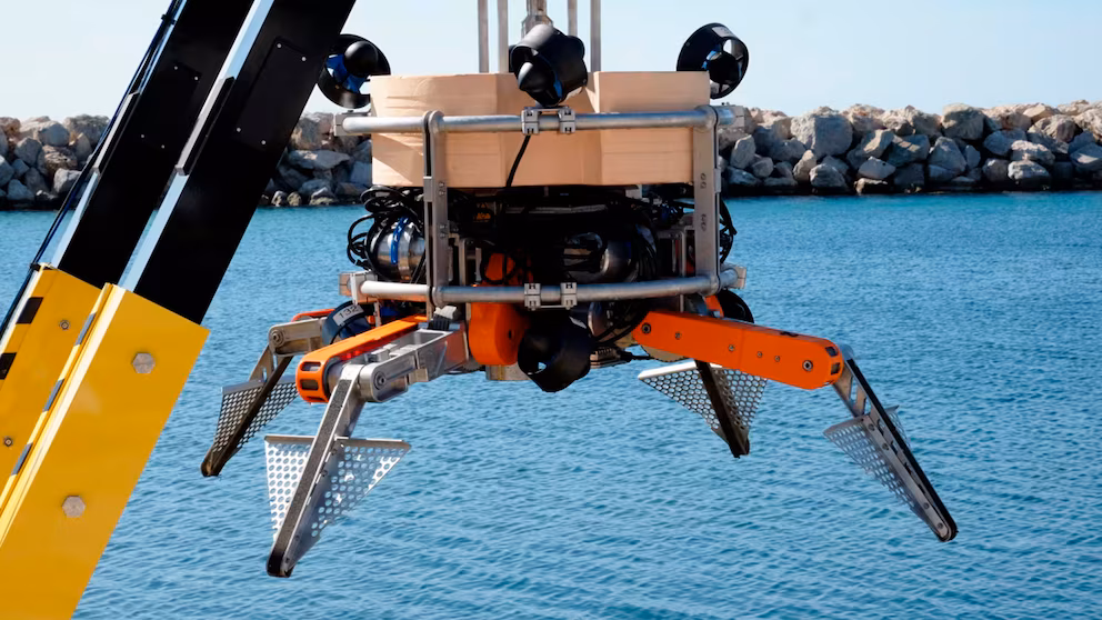 Equipped with AI trained on 7,500 images, the Smart Grapple underwater robot dives over 300 meters to identify trash among marine life and grab objects weighing up to 250 kg, replacing divers in cleaning missions that can operate 24 hours a day