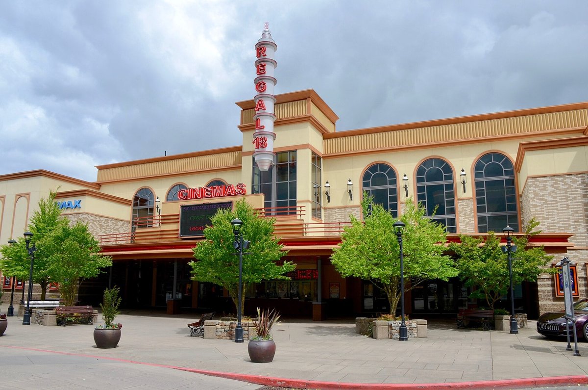 Exterior of a Regal Cinemas movie theater with its red sign above the entrance